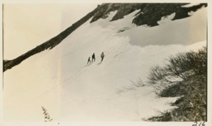 Image: Three people climbing mountain in snow